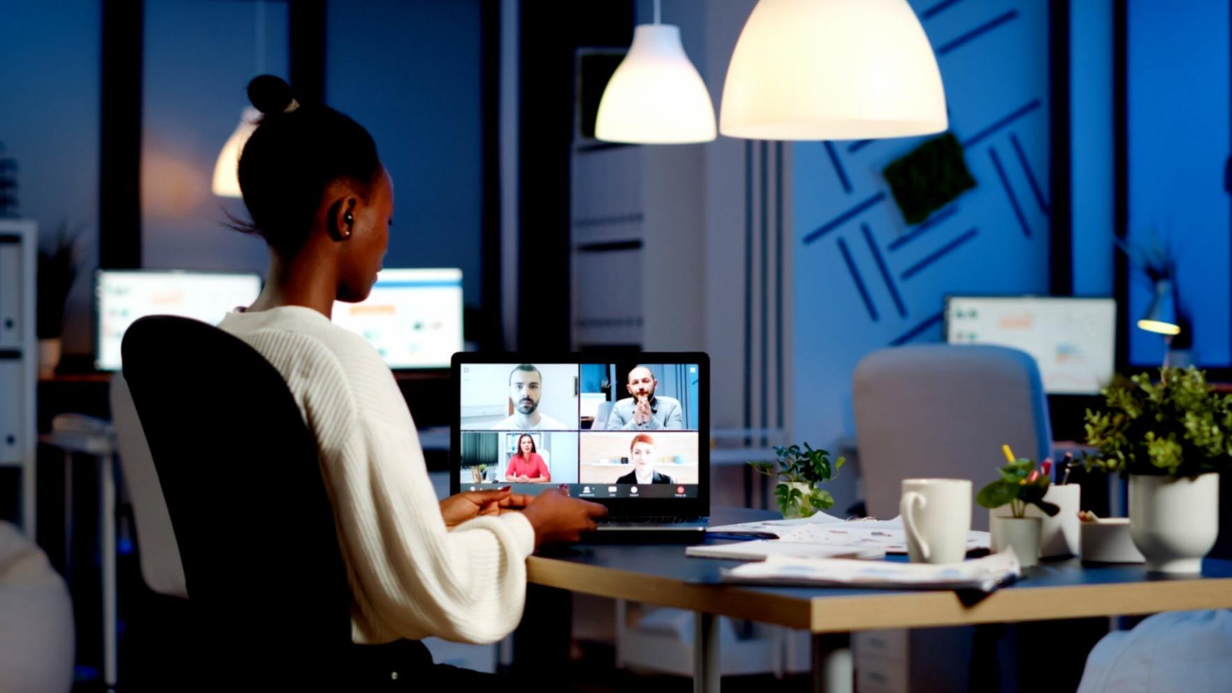 Network security operations center with multiple monitoring screens showing firewall traffic analysis