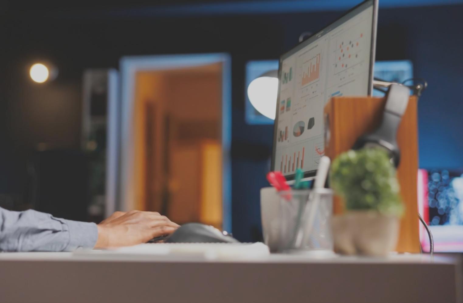 Cybersecurity training lab with multiple monitors showing network security dashboards